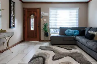 8902 CLAREMONT Avenue NE Living Room