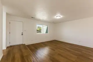 12008 GOLDEN GATE Avenue NE Living Room
